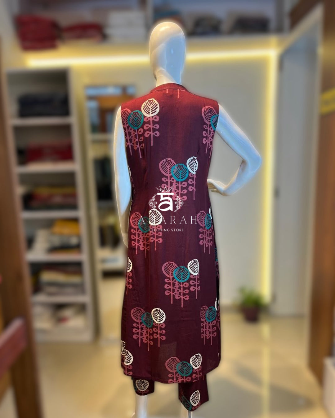 cord set with floral design.( Sleeves attached.)