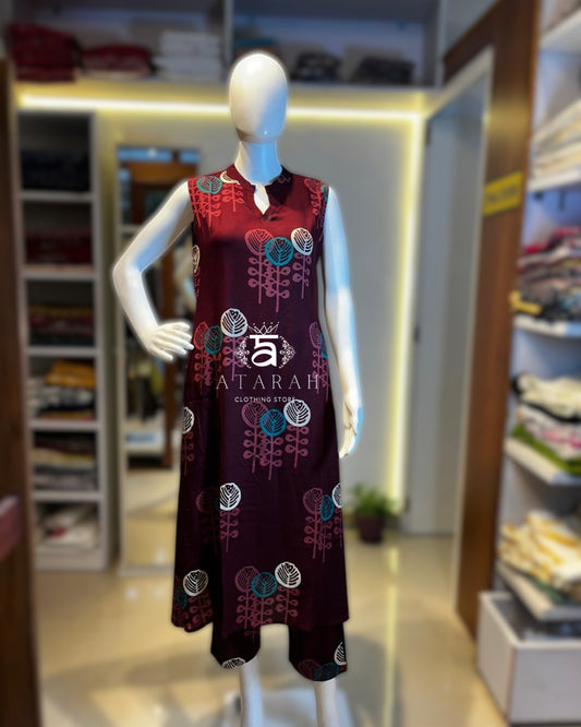 cord set with floral design.( Sleeves attached.)